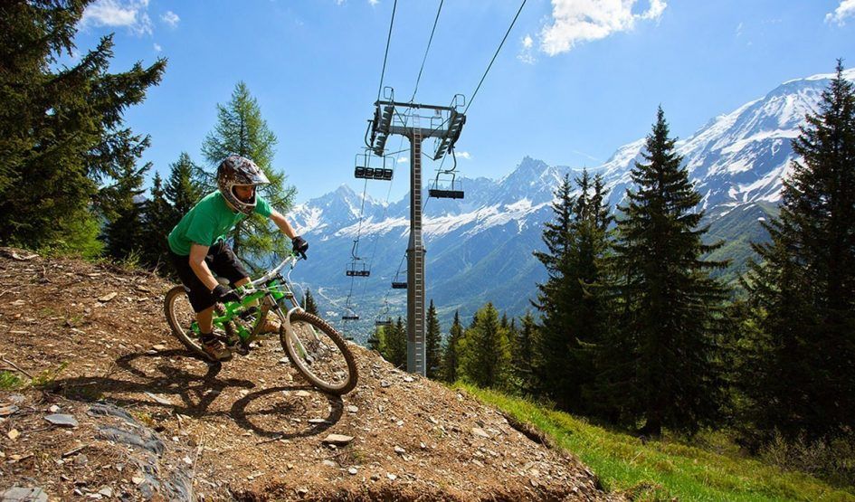 Mountain biking in Chamonix, with views of the Chamonix valley in the background 