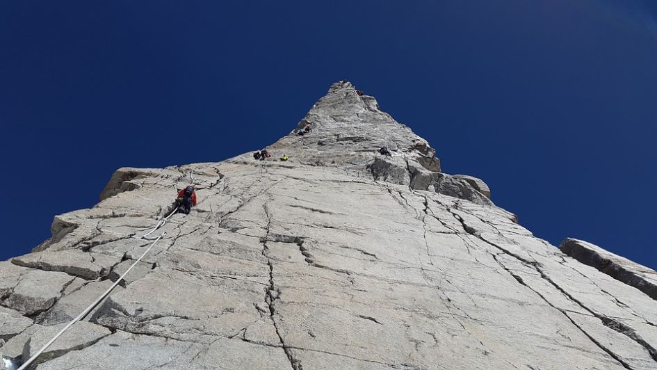 Climbing in Chamonix. Vertical Rock. Dent Du Geant. 