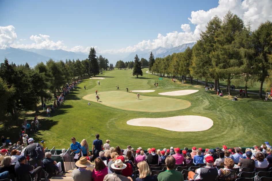 Crans Montana's golf course hosting the Omega European Masters tournament, in view of the mountains.