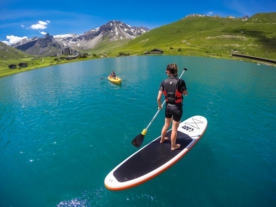 Paddle boarding in Tignes on a luxury summer holiday in Tignes