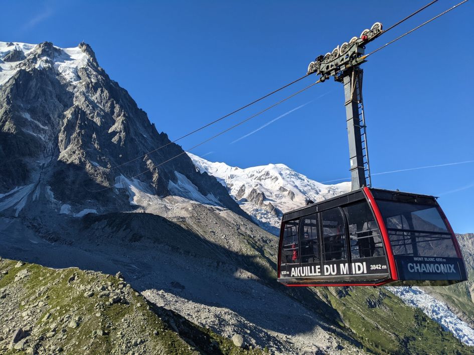 Aiguille du Midi Cable Car in Chamonix © Rebecca Bradshaw The Aiguille du Midi cable car is one of our top things to do in Chamonix, when on your French Alps summer holiday!