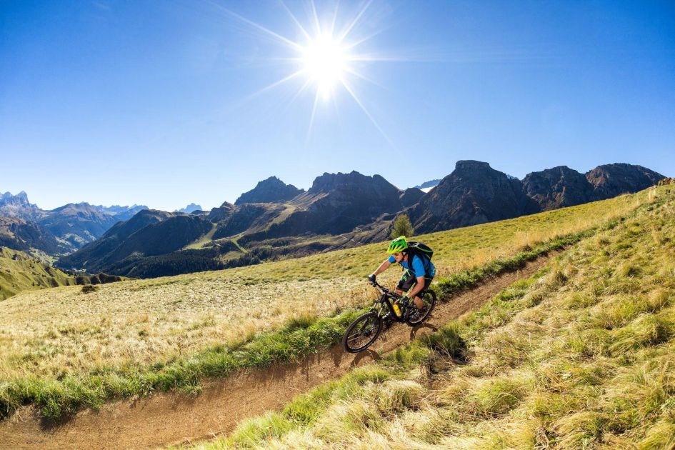 Man mountain biking in the Dolomites