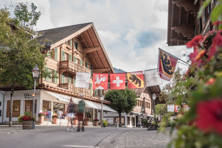 Image of the village of Gstaad in Summer. One of the best areas for a Summer mountain holiday.