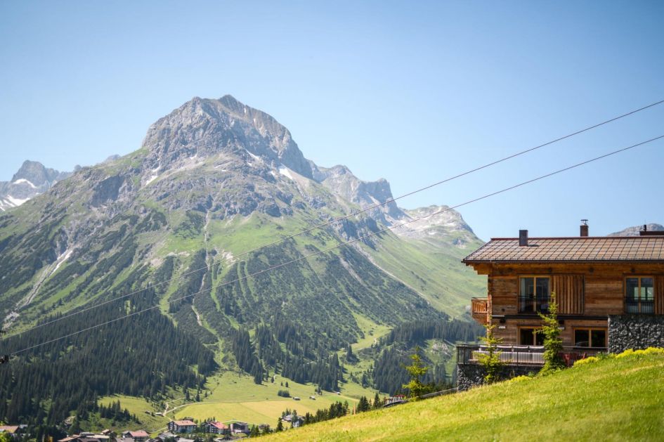 Arula Chalets look out to fascinating mountain views of the Arlberg in summer.