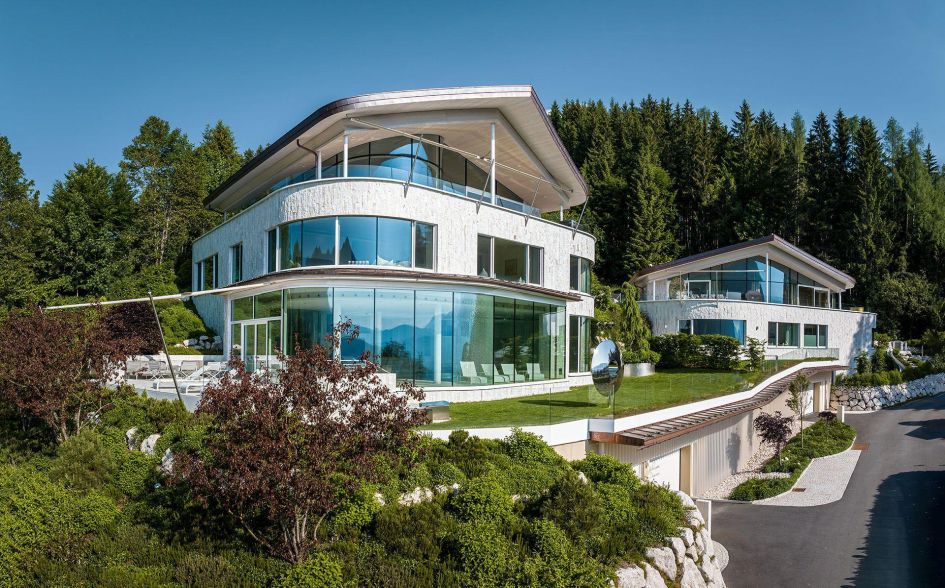 Julisam Estate's sleek, white interiors and exteriors showcases what you'd expect from a top mountain villa in Austria, not purely just one of the large summer chalets in the region!
