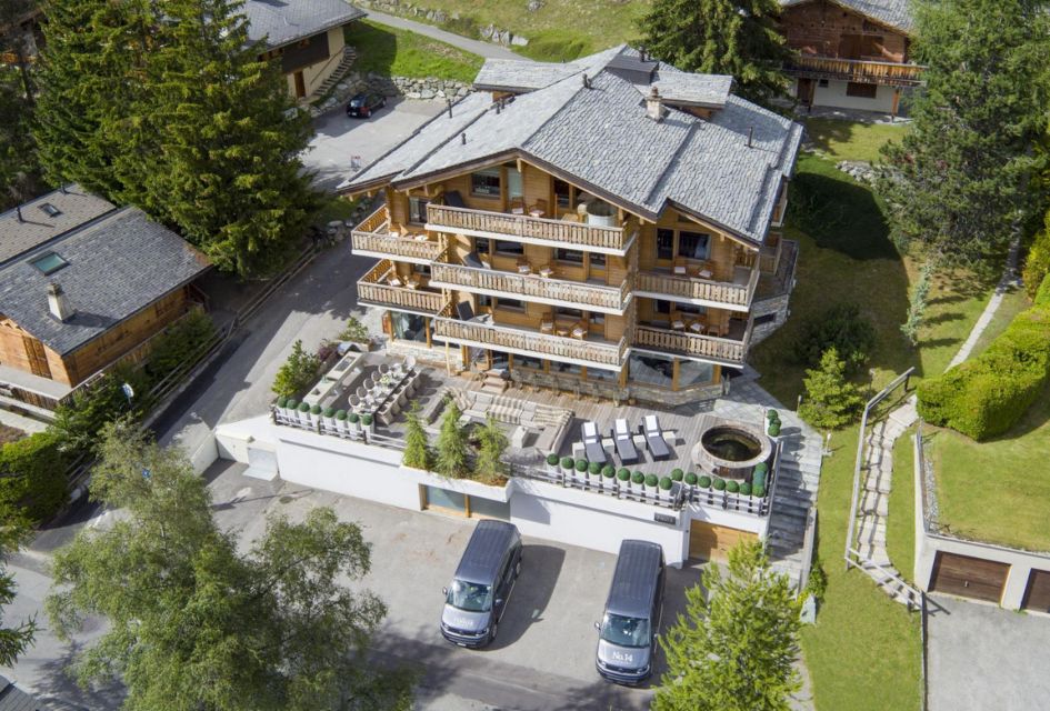 Chalet No 14 is the second of large summer chalets in Verbier to feature on our list. Its light wooden facade, extensive terrace and surrounding gardens can be seen from this birds-eye-view photo!