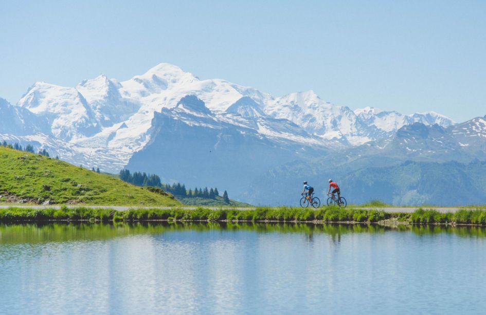 Cycling by lakes and mountains in Morzine.