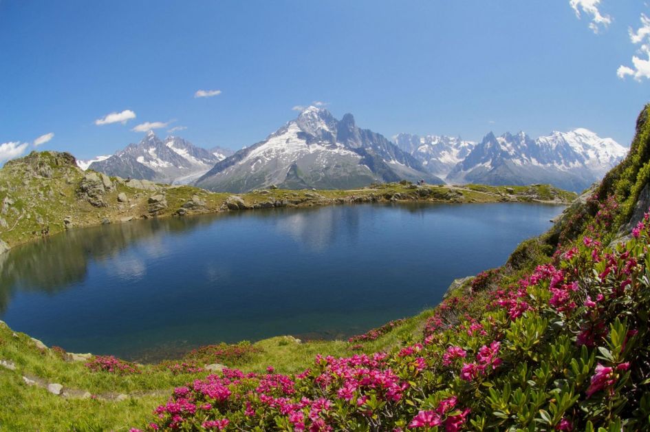 Sensational views overlooking a lake in Argentière with sights of Mont Blanc Massif in the distance.
