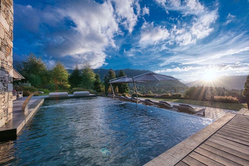 Chalet Aspen's stunning outdoor swimming pool with a wonderful outlook on the mountain views ahead.