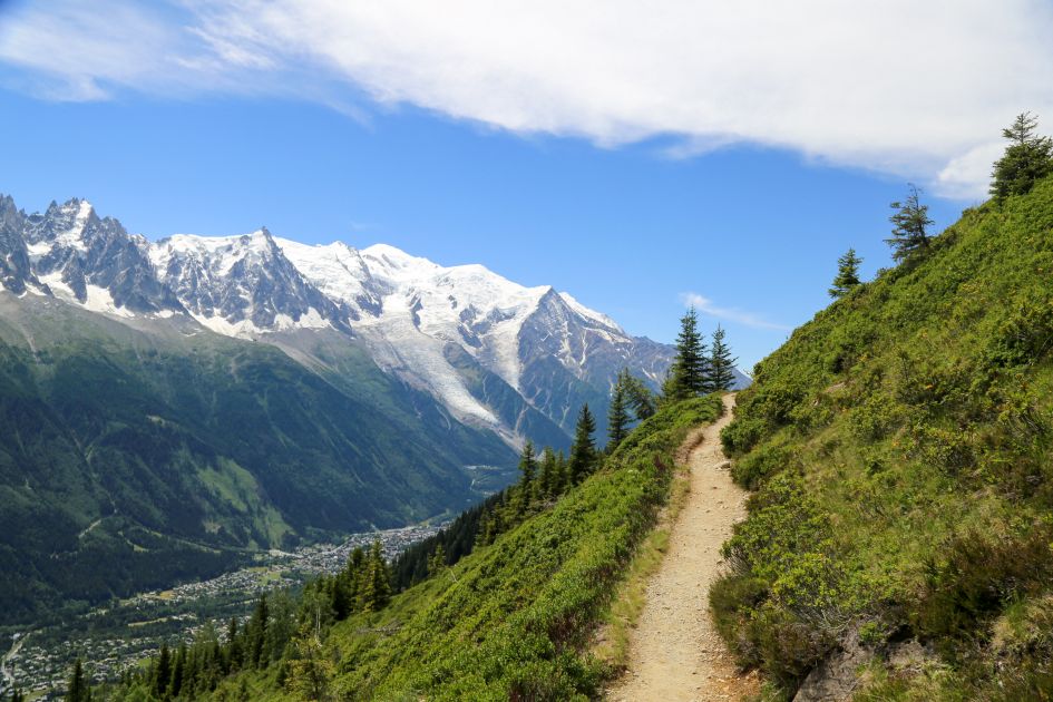 A scenic hiking route in Chamonix with stunning views across the valley to Mont Blanc.