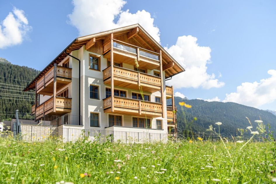 Chalet Lena, St Anton The modern alpine exterior of Chalet Lena with its scenic forest surroundings.